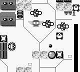 Trax (Game Boy) screenshot: Drones, warehouses, and the skull mark of the Master Tank Master.