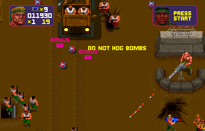 Total Carnage (Arcade) screenshot: Take out that gunner.