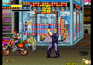 Burning Fight (Arcade) screenshot: Shooting a biker.
