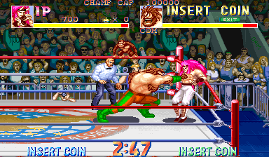 Saturday Night Slam Masters (Arcade) screenshot: Pinned against the ropes.