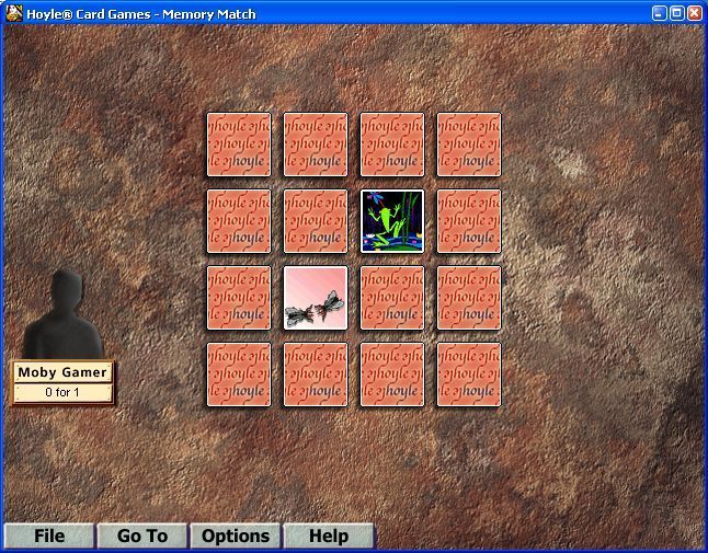 Hoyle Card Games (Windows) screenshot: A game of 'Memory Match' using the default grid size. All games are scored based on the number of turns taken to clear the grid