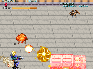 Rohga: Armor Force (Arcade) screenshot: Destroying a truck.
