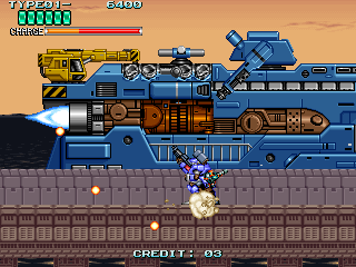 Rohga: Armor Force (Arcade) screenshot: Blasting the end of level boss.