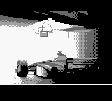 F-1 World Grand Prix (Game Boy Color) screenshot: A monochrome car sets the mood as it absorbed into the light of the sun.