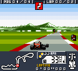 F-1 World Grand Prix (Game Boy Color) screenshot: A sharp swerve seems to be coming up. Oh, and welcome to Japan.