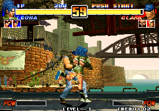 The King of Fighters '96 (Arcade) screenshot: Leona kicks Clark in cojones
