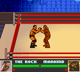 WWF Attitude (Game Boy Color) screenshot: The rock and mankind grapple