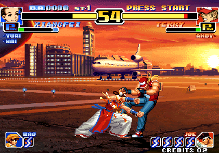 The King of Fighters '99: Millennium Battle (Arcade) screenshot: Double hit in Terry's cojones