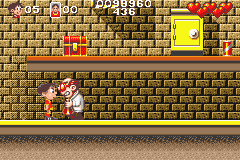 Soccer Kid (Game Boy Advance) screenshot: A mad scientist who throws flammable bottles at you