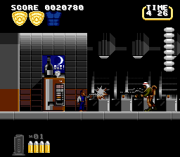 Lethal Weapon (SNES) screenshot: The boss of mission 2 attacks with grenades and his assault rifle.