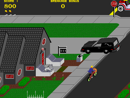 Paperboy (Arcade) screenshot: That hearse is blocking the path.