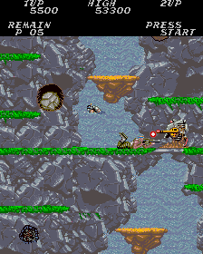 Contra (Arcade) screenshot: Falling rocks