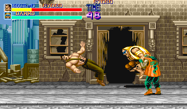 Final Fight (Arcade) screenshot: First boss Damnd