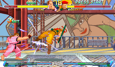 Street Fighter Alpha 2 (Arcade) screenshot: Rolento's stage - big lift from Final Fight industry zone