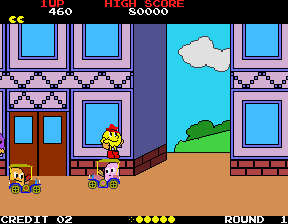 Pac-Land (Arcade) screenshot: Hitching a ride.