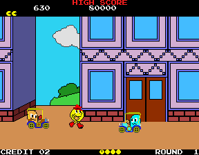 Pac-Land (Arcade) screenshot: Avoid the cars.