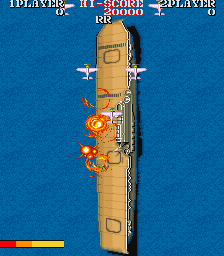 1943: The Battle of Midway (Arcade) screenshot: Your ship under attack.