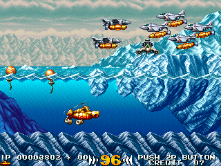 In the Hunt (Arcade) screenshot: Planes with bombs