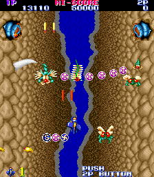 Gemini Wing (Arcade) screenshot: Flying scorpion with bonuses