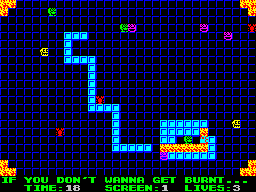 Pyromania: Trial By Fire (ZX Spectrum) screenshot: Run over your blue blocks to put them on fire