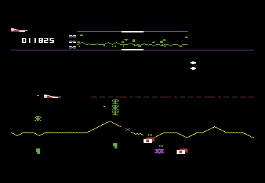 Defender (VIC-20) screenshot: Shooting at some assorted enemies
