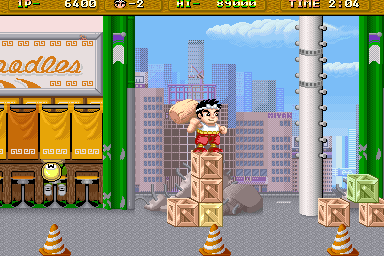 Hammerin' Harry (Arcade) screenshot: Hit or jump the boxes.