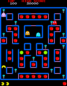 Super Pac-Man (Arcade) screenshot: Normal Pac-Man eating apples.