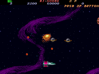 Hellfire (Arcade) screenshot: Blasting the aliens.