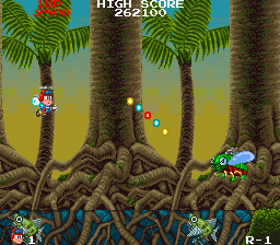 Insector X (Arcade) screenshot: Fish and a fly to contend with.