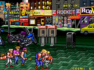 The Combatribes (Arcade) screenshot: Low punch.