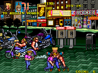 The Combatribes (Arcade) screenshot: Smashing heads together