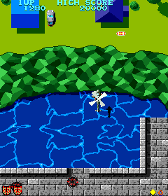 Tiger-Heli (Arcade) screenshot: Approaching land.