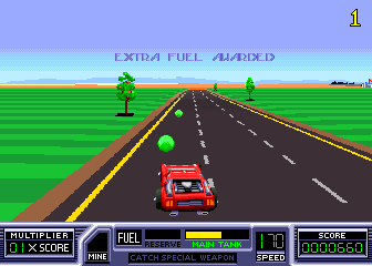 RoadBlasters (Arcade) screenshot: Pick up green spheres for extra fuel
