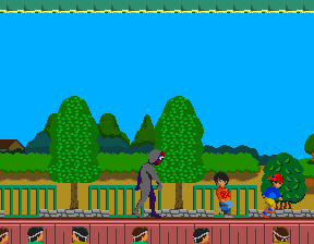 Wonder Momo (Arcade) screenshot: Monster chasing the kids.