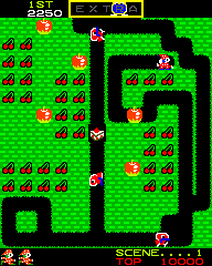 Mr. Do! (Arcade) screenshot: Collecting cherries.