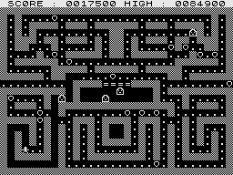 Puckman (ZX81) screenshot: Eating a strawberry