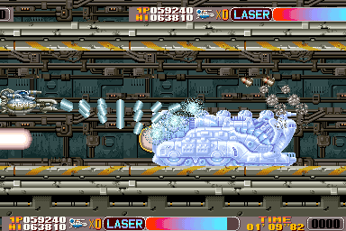 Cosmic Cop (Arcade) screenshot: Use laser to destroy the big guy