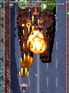Armed Police Batrider (Arcade) screenshot: Keep blasting it.