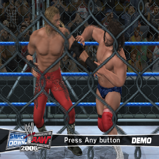 WWE Smackdown vs. Raw 2006 (PlayStation 2) screenshot: If the player leaves the game alone at the START screen it will load and run a series of short demonstrations. Some, like this are in a cage while others are in a ring