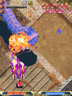 Guwange (Arcade) screenshot: A giant worm