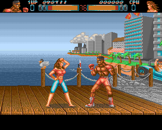 Body Blows (Amiga) screenshot: Maria fights with Junior