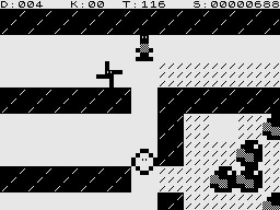 Boulder Logic (ZX81) screenshot: Various odd creatures roam the mines