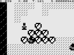 Boulder Logic (ZX81) screenshot: Kill a baddy and you might get lots of diamonds