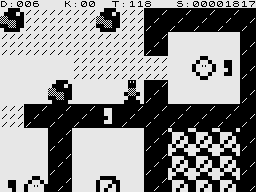 Boulder Logic (ZX81) screenshot: Need to get the key to unlock the room