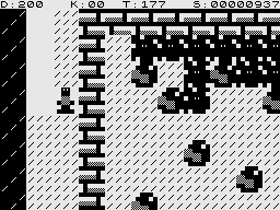 Boulder Logic (ZX81) screenshot: The black things keep multiplying