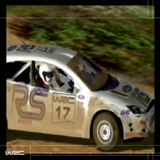 WRC World Rally Championship (PlayStation 2) screenshot: Between the title screen and the man menu is an animated sequence of cars tearing through the countryside in all conditions