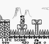 The Flintstones: King Rock Treasure Island (Game Boy) screenshot: Avoid the spikes.