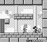 Mickey Mouse: Magic Wands! (Game Boy) screenshot: Watch the baddy.