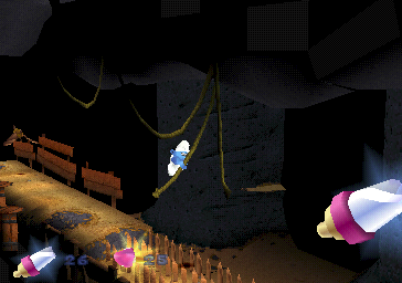 The Smurfs (PlayStation) screenshot: There are traps, like these spikes, to be negotiated. At such places it is often possible to swing across the gap