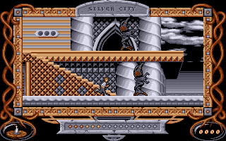The Neverending Story II: The Arcade Game (Amiga) screenshot: Monsters must be avoided or defeated in order to navigate the Silver City.